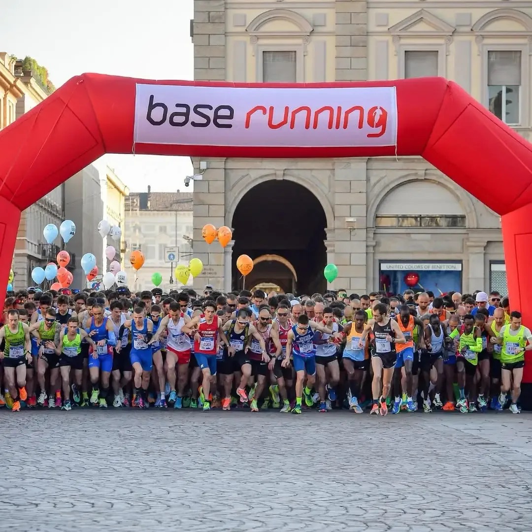 The start of a Base Running race under the red arch